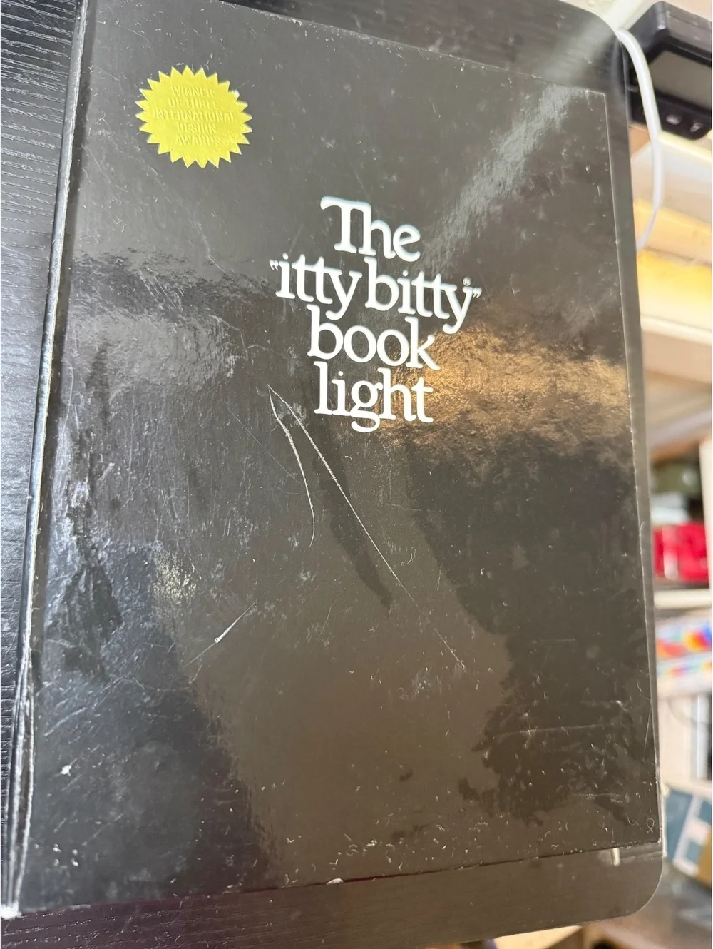 The itty bitty book light by Zalco - Vintage Reading Light 1982